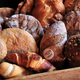basket full of different types of bread